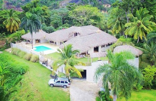 Las Terrenas Villa | Casa Cocoloba offers a splendid view of the sea and 4000 meters of parkland.
