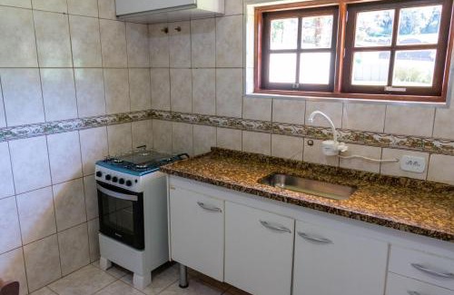Vila Britania House | Casa com grande quintal em Campos do Jordão