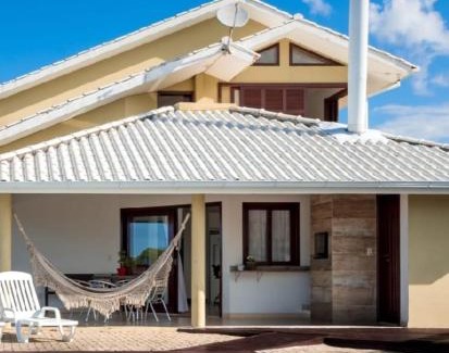 Santinho House | Casa com piscina frente ao mar Praia do Santinho