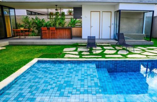 Jardim Acapulco House | Casa de Cinema no Guarujá - Condomínio Acapulco