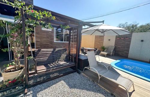 Ze Amandio House | CASA GOLFINHO 348 - casa aconchegante com piscina, churrasqueira, mesa de sinuca e jogos