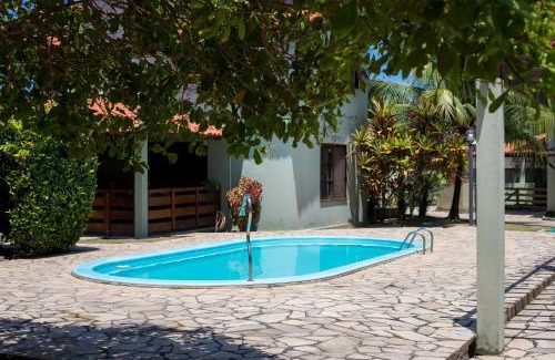 Barra Mar House | Casasveraneio casa top com 3 suítes com ar condicionado a 100 m da Praia - Barra de São Miguel, 7 minutos do gunga e 3 da praia bonita e conchas ! Área gourmet particular com churrasqueira , chuveirão !condomínio com muito verde,piscina de 10m!
