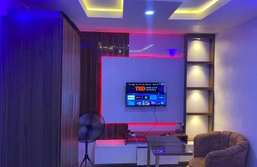 Abeokuta Apartment | Cee&Tee ABEOKUTA 1BR-247Electricity - Solar Inverter AC in bedroom