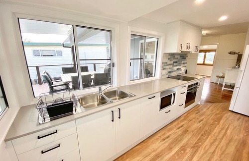 Red Rock House | Central, River Frontage, Large Covered Rear Deck, Renovated Cottage!