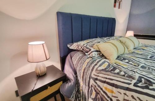 Nunoa Apartment | Cercano a Megavisión con Estacionamiento