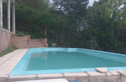 Villa Carlos Paz Ski Chalet | Chalet de Montaña a 8 cuadras del centro de Carlos Paz con pileta de 9 x 4