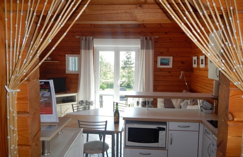 Plozevet Ski Chalet | Chalet overlooking Audierne Bay with wooded garden,