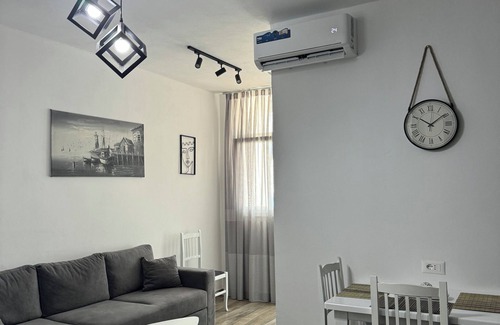 Kamez Apartment | Charming 1-bedroom in Bathore with AC, Wi-Fi, parking, and car rentals.