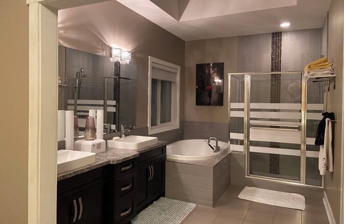 Chestermere House | "Charming 2-Bedroom, 2-Bathroom Sanctuary: Your Upstairs Retreat Awaits!"
