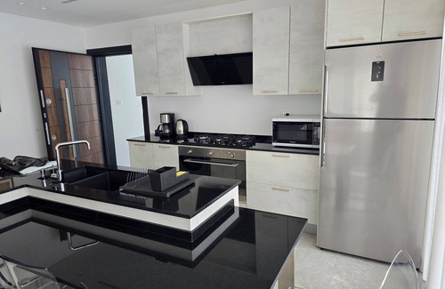 Suwailih Apartment | Charming 2-bedroom rooftop apartment with mountain view in Amman