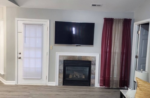 Charlotte House | Charming 3-bedroom house with WiFi, AC in serene Charlotte.