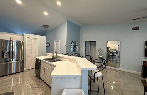 Lehigh Acres House | Charming 4-bedroom house with headed pool, AC, wifi and games. Fun for all!