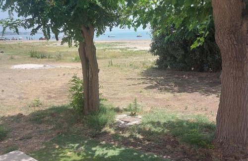 Katakolo House | Charming Beachfront 2-bedroom house with AC