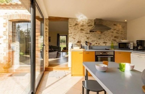 Saint-Brevin-les-Pins Cottage | Charming Stone Cottage Near Beaches with Enclosed Garden and Sports Amenities