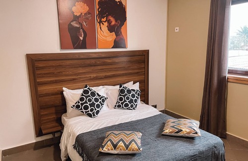 Cantonments Hotel | Charming hotel room in Osu