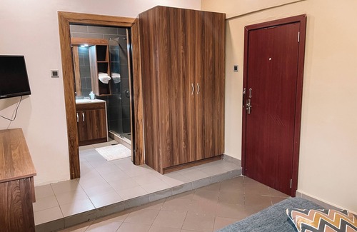 Cantonments Hotel | Charming hotel room in Osu