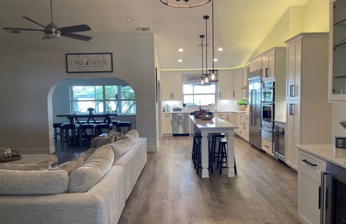 Highland House | Charming Lake View House on Redwater Lake with dock, gazebo, and hot tub.