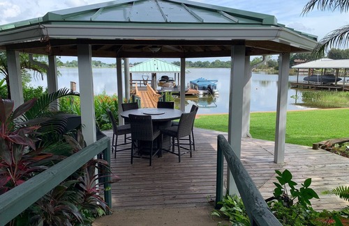 Highland House | Charming Lake View House on Redwater Lake with dock, gazebo, and hot tub.
