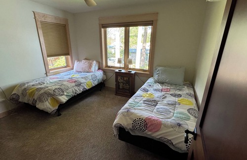 Shawano Hotel | Charming new lake house with beautiful views. Pier for swimming and fishing.