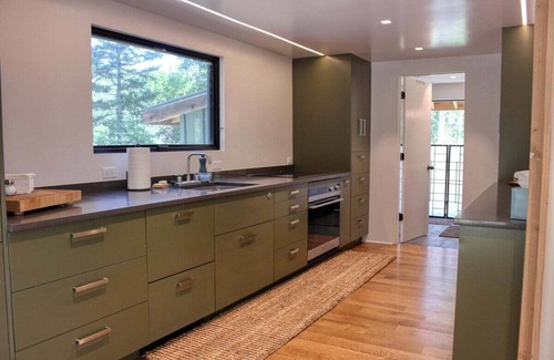 Hailey House | Charming Scandinavian Modern Riverfront Fishhouse