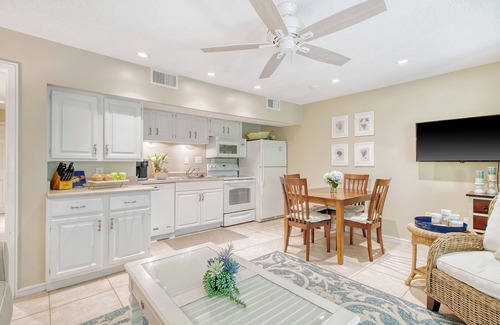 West Beach Village Villa | Charming villa across from beach access