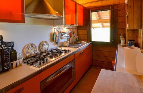 Pieve Santo Stefano House | Charming wooden house, situated on a hill, between Florence and San Marino.