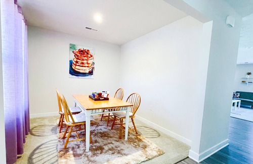 Amelia House | Cheerful 2- bedroom home with parking garage