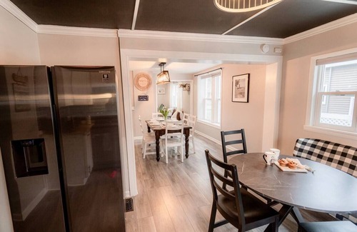 South Haven House | Cherry Door Cottage -Enclosed Backyard, Walk Downtown, Hot Tub!