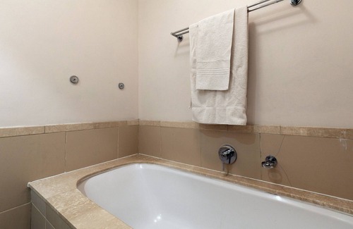 Lagoon Beach Apartment | Chic Home, Lagoon Views situated within a Hotel