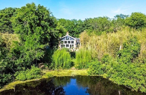Mattituck House | Chic Mattituck waterfront home with beautiful views, slate patio, heated...