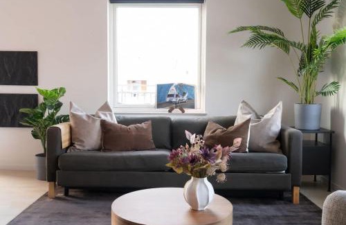 Bastad House | Chocolaty Warmth Home 3BR Flat with Cozy Balcony