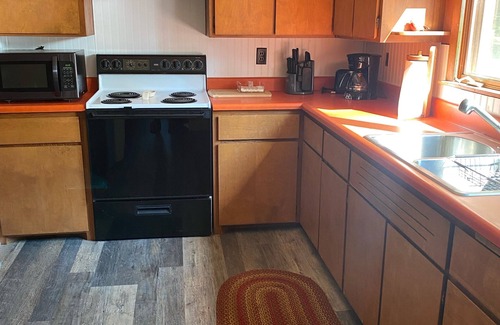 Manitowish Waters Cottage | Classic Northwoods Cabin for Summer or Winter vacation. Snowmobiler’s paradise!
