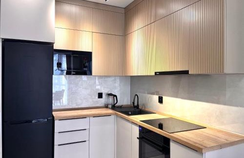 Almaty Apartment | Classic Raimbek15 Residence 1BR, nearby metro, drinking water as a gift