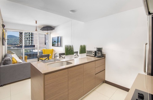 Pavas Apartment | Classy Apartment w/King Bed Close to Airports