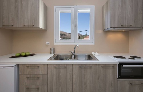 Kassiopi Apartment | Close to the beach, spacious one-bedroom apartment with sea views.