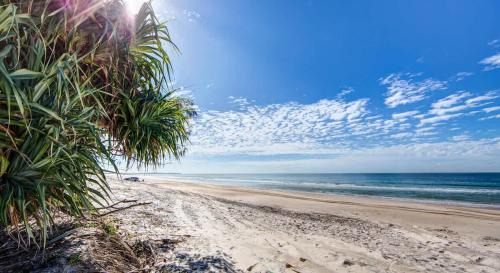 Bellara Apartment | Coastal Comforts with Pumicestone Passage Views