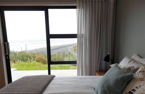 Waiiti House | Coastal gem - prime beachfront home at Waiiti beach.