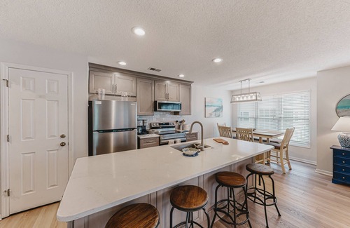 Sea Trail Condo | Coastal resort condo with on-site pools, hot tub, game room, & golf