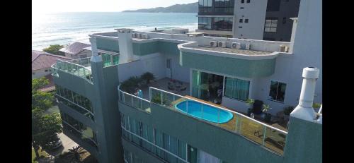 Canto Grande Apartment | Cobertura com Piscina 50 mt do Mar