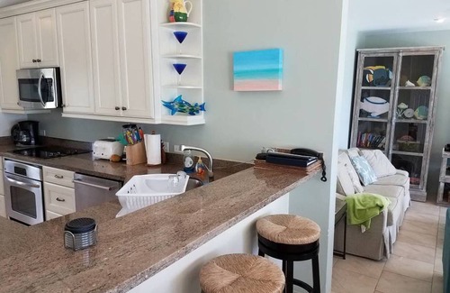 North Side House | Coco Kai Beach Front Villa with Heated Pool and Private Dock