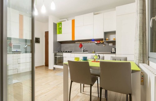 Le Cure Apartment | Colorful Boccaccio apt with Patio and Motorcycle Place