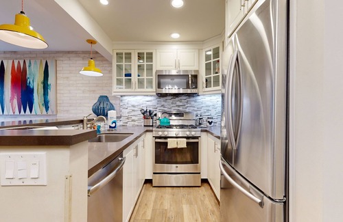 Hermosa Village Condo | Colorful & contemporary condo with patio & washer/dryer - watch the fireworks