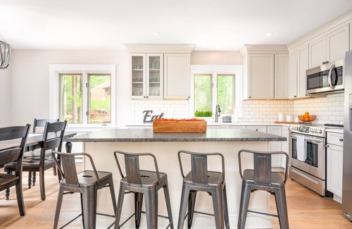 North Conway Villa | Colorful Oasis: Modern, Water View, Family-Friendly