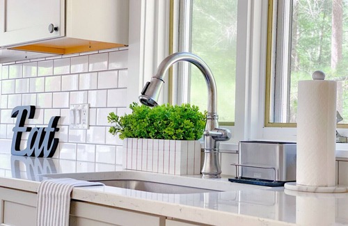 North Conway Villa | Colorful Oasis: Modern, Water View, Family-Friendly