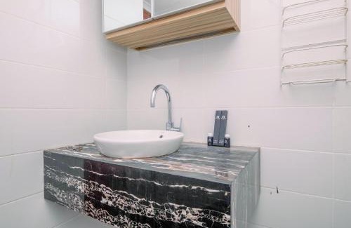 Semanggi Apartment | Comfort 2BR + Extra Room at Sudirman Tower Condominium Apartment By Travelio