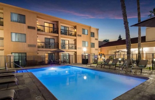 Downtown Village House | Comfort and Convenience! Spacious Unit with Pool View, Outdoor Pool, Parking
