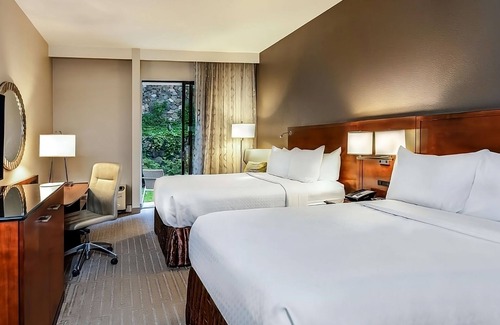 Executive Park Hotel | Comfort and Convenience! 3 Convenient Units, Pet-Friendly, Parking, Pools!