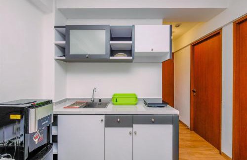 Kayu Putih Apartment | Comfortable and Warm 2BR at Tifolia Apartment By Travelio