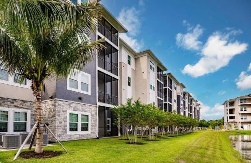 Fort Myers Apartment | Community oasis with pool & gym access