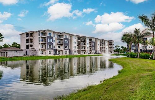 Fort Myers Apartment | Community oasis with pool & gym access